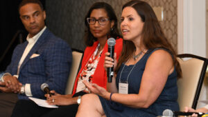From left, College of Engineering Dean Alec D. Gallimore, Sheri Notaro, DEI director for the Institute for Social Research, and Associate General Counsel Maya Kobersy participate in a panel discussion during a DEI leadership retreat.